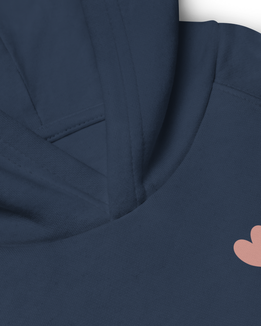 Navy kids hoodie with a small heart on the front, Aurora Soulwear.