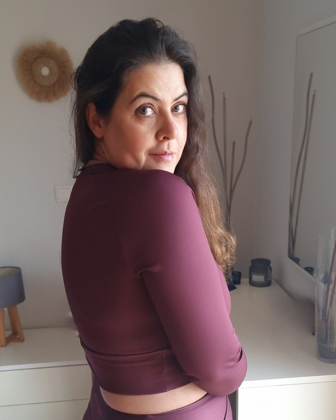 Rita wearing EMBER recycled long sleeve from Move collection by Aurora Soulwear