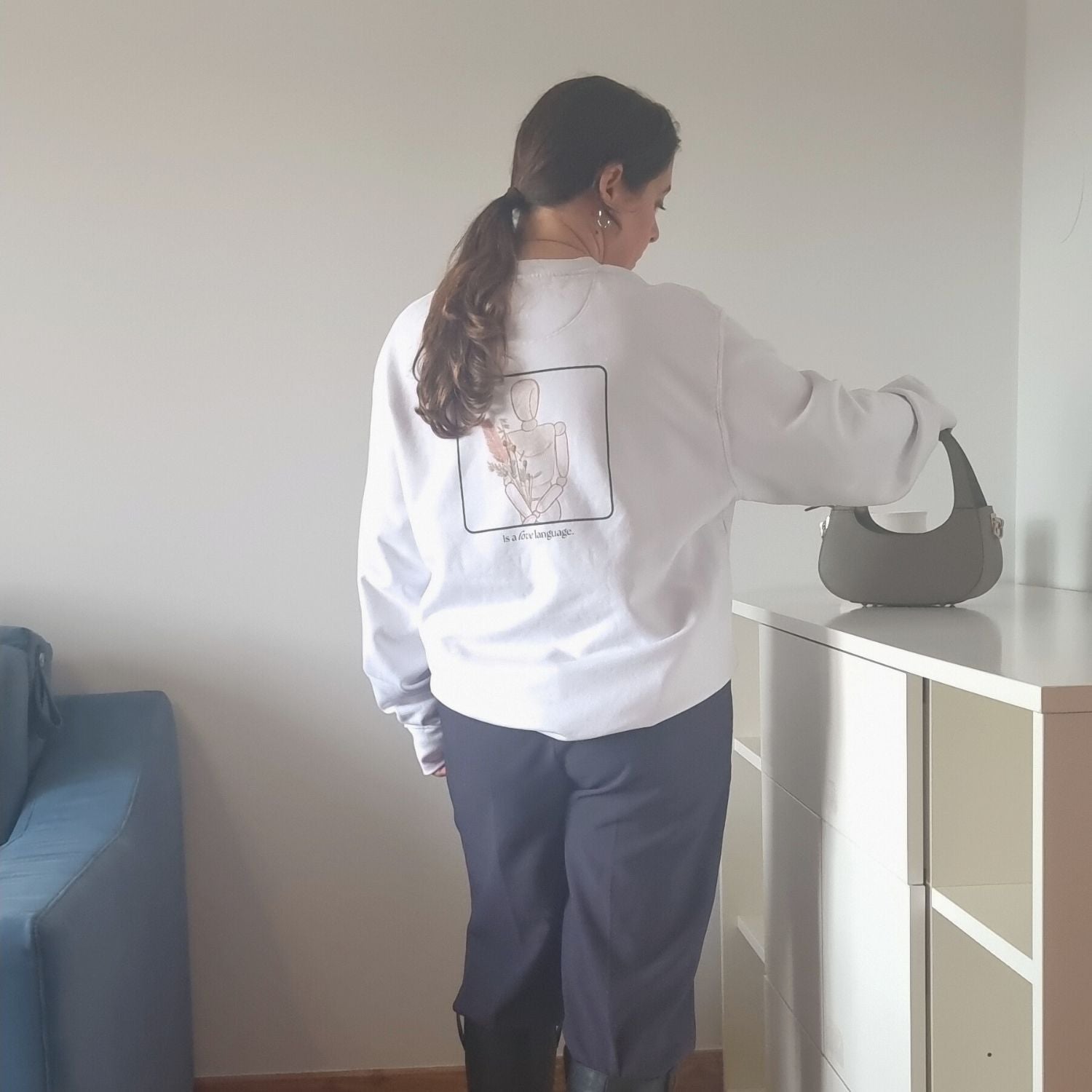 Consistency Organic Sweater in white with Consistency Is A Love Language back print and hand-drawn illustration