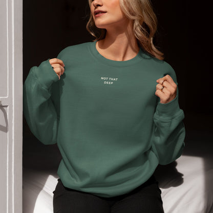 Deep Recycled Sweater in forest green with Not That Deep front print