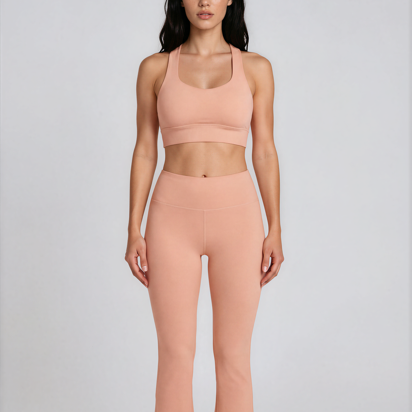 Duna Recycled Sport Top in warm peach tone with brand back detail