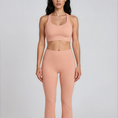 Duna Recycled Sport Top in warm peach tone with brand back detail