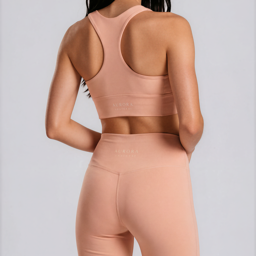Duna Recycled Flare Leggings in warm peach tone