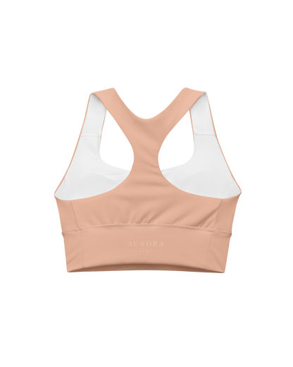 Duna Recycled Sport Top in warm peach tone with brand back detail