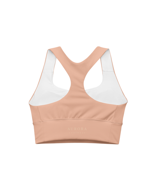 Duna Recycled Sport Top in warm peach tone with brand back detail