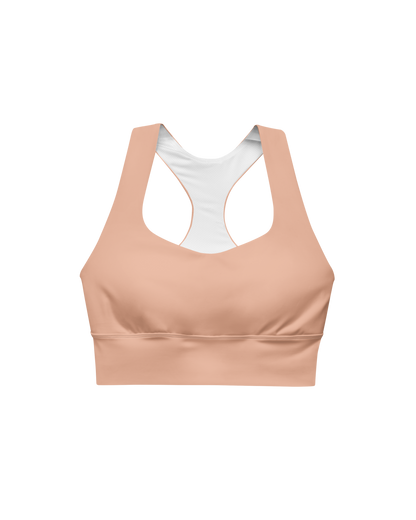 Duna Recycled Sport Top in warm peach tone with brand back detail