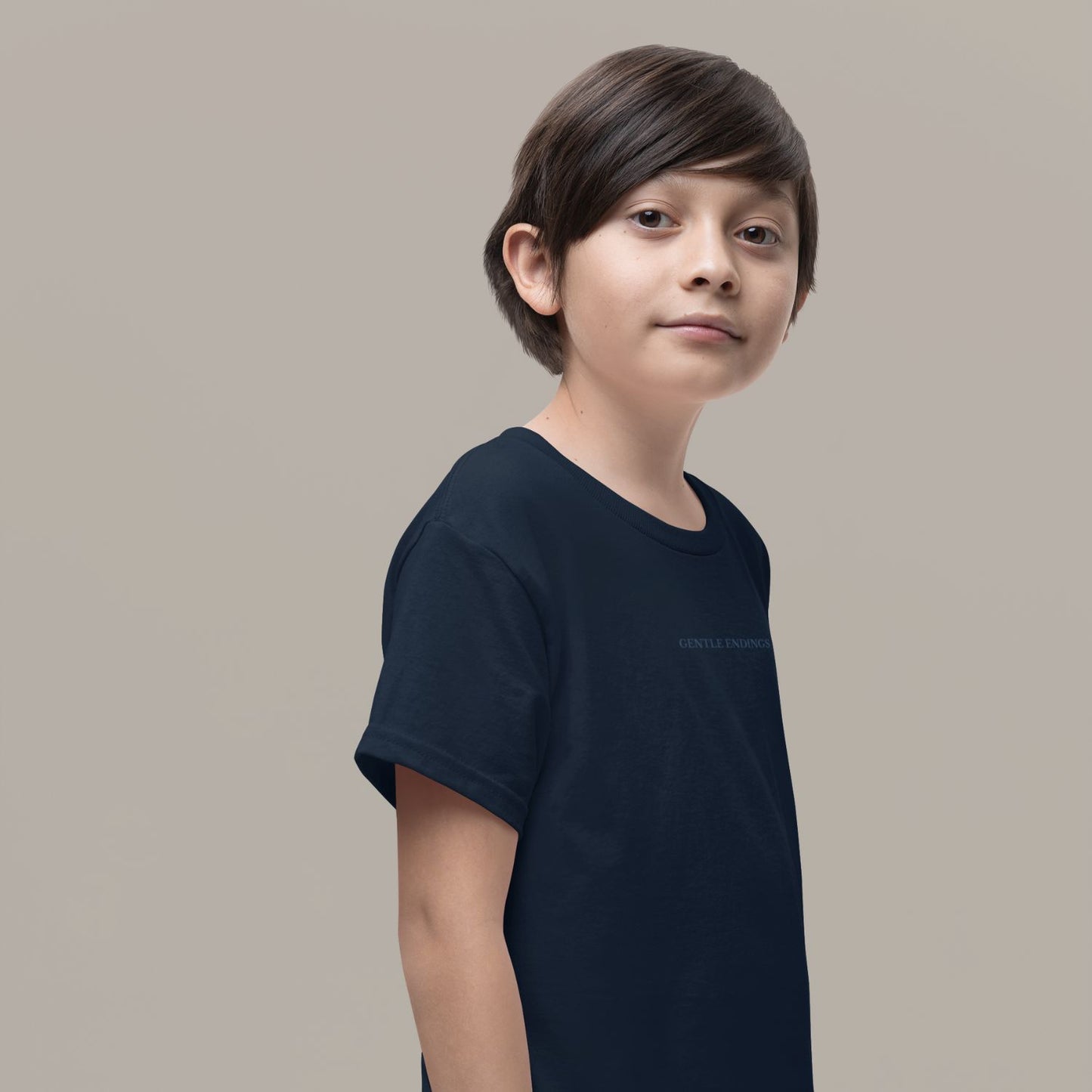 Gentle Endings Organic Kids T-shirt in navy blue with star and Gentle Endings Tender Beginnings back print