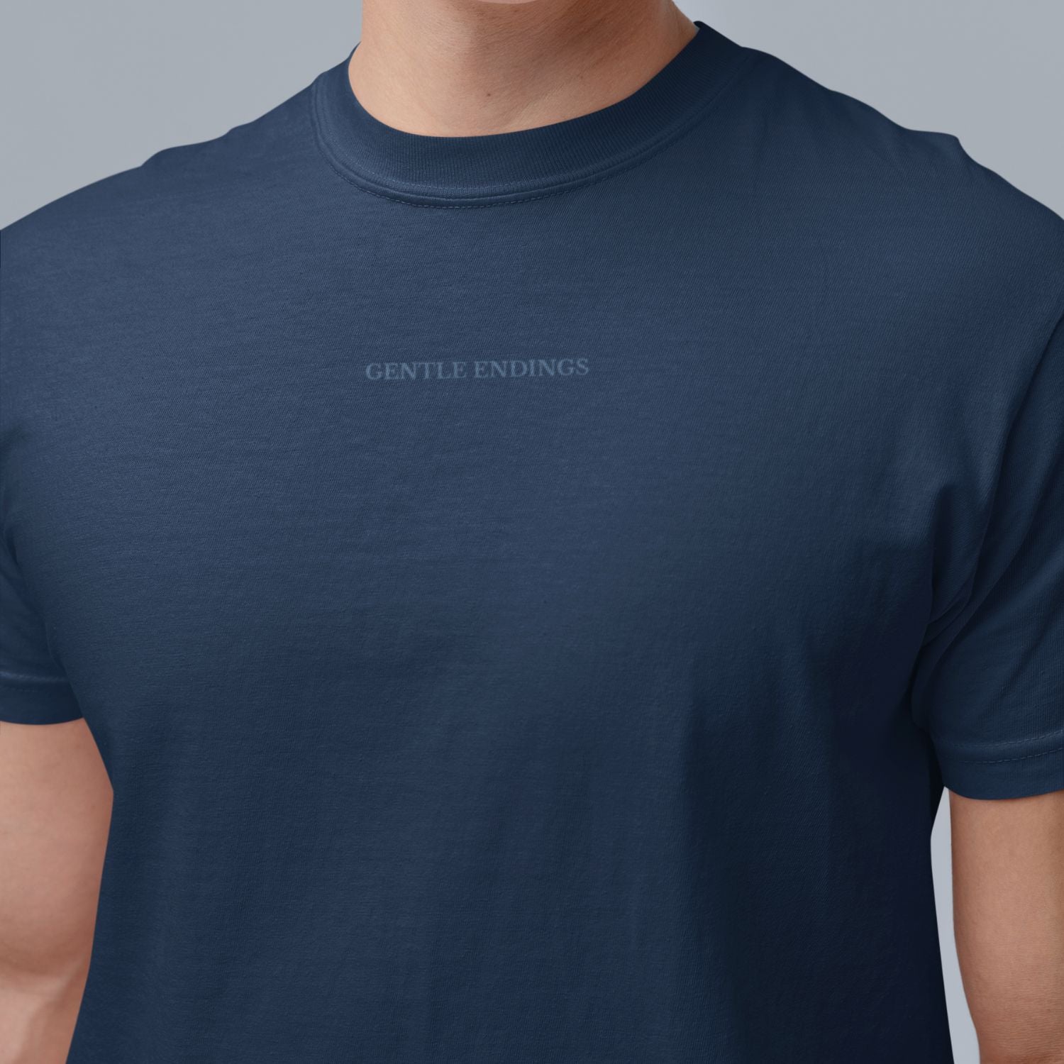 Gentle Endings Organic T-shirt in navy blue with star and Gentle Endings Tender Beginnings back print