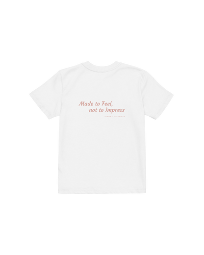 White organic cotton kids t-shirt with a small heart on the chest, Aurora Soulwear.