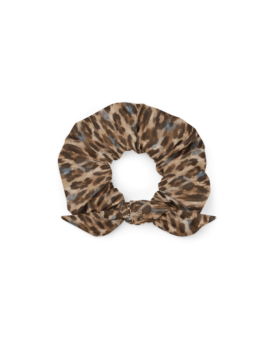 Leopard-print hair scrunchie with removable bow, from Aurora Soulwear's Heatwave collection.