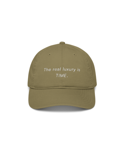 Time Organic Cap in jungle green with The Real Luxury Is Time front embroidery and Aurora Soulwear back embroidery