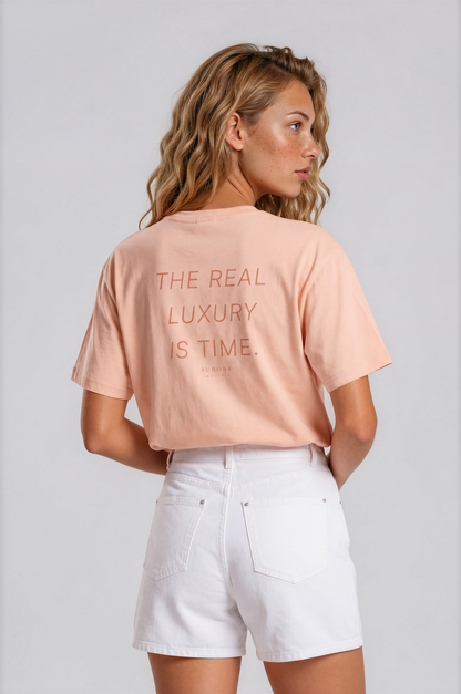Time Organic Cotton T-shirt in peach with 'The Real Luxury Is Time' back print