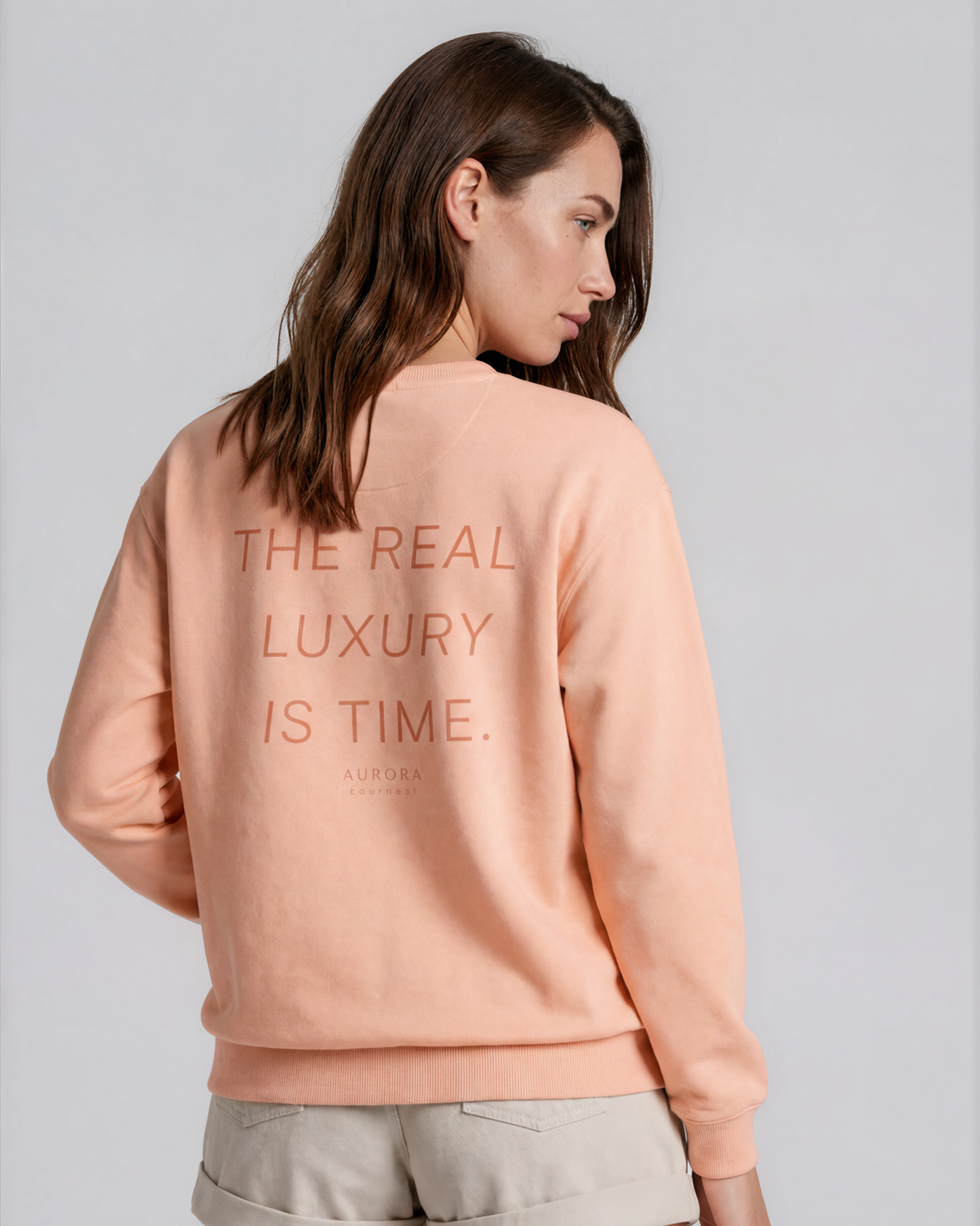 Time Recycled Sweatshirt in peach with 'The Real Luxury Is Time' back print